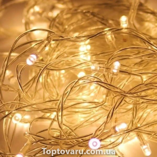 Гірлянда лінійна внутрішня 220V 300LED 4562 AND 108-5 Прозорий провід, тепле світло 31117 фото