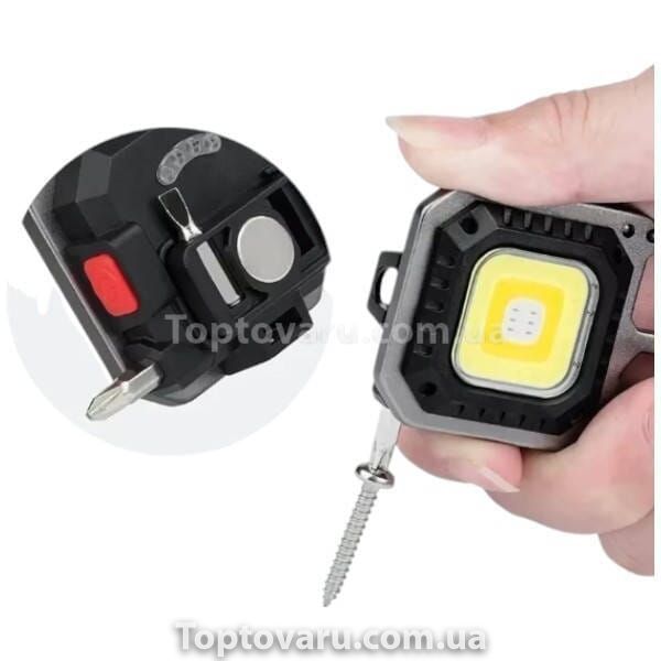Брелок ліхтар багатофункціональний (Ліхтар, відкривачка, викрутка, склобій) 20751 фото