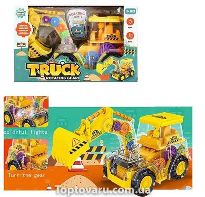 Игрушка Трактор с шестеренками с подсветкой и звуком Truck Rotating Gear Желтый 15316 фото