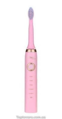 Електрична зубна щітка Shuke з 4-ма насадками Рожева 4559 фото
