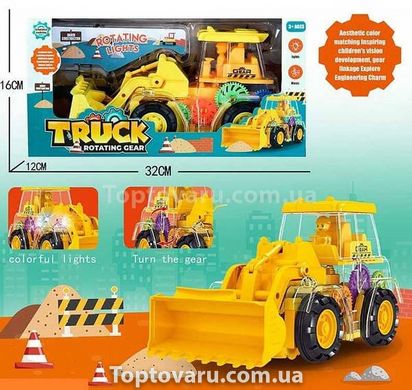 Іграшка Трактор із прозорим корпусом із підсвічуванням та звуком Truck Rotating Gear Жовтий 15319 фото