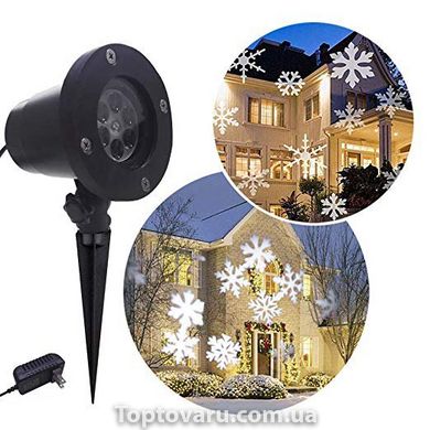 Декоративний вуличний світлодіодний проектор Outdoor lawn snowflake light 1300 фото