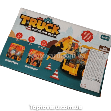 Іграшка Трактор Гідромолот із прозорим корпусом із підсвічуванням та звуком Truck Rotating Gear Жовтий 15323 фото