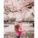 Картина за номерами Strateg ПРЕМІУМ Дівчинка у квітах сакури розміром 40х50 см (GS229) GS229-00002 фото 1