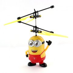 Іграшка літаючий міньйон в червоному комбінезоні (вертоліт) 3992 фото