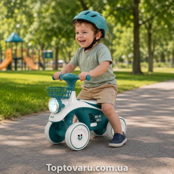 Велобіг дитячий музичний з підсвічуванням та кошиком 47*38*60см Бірюзовий 38317 фото